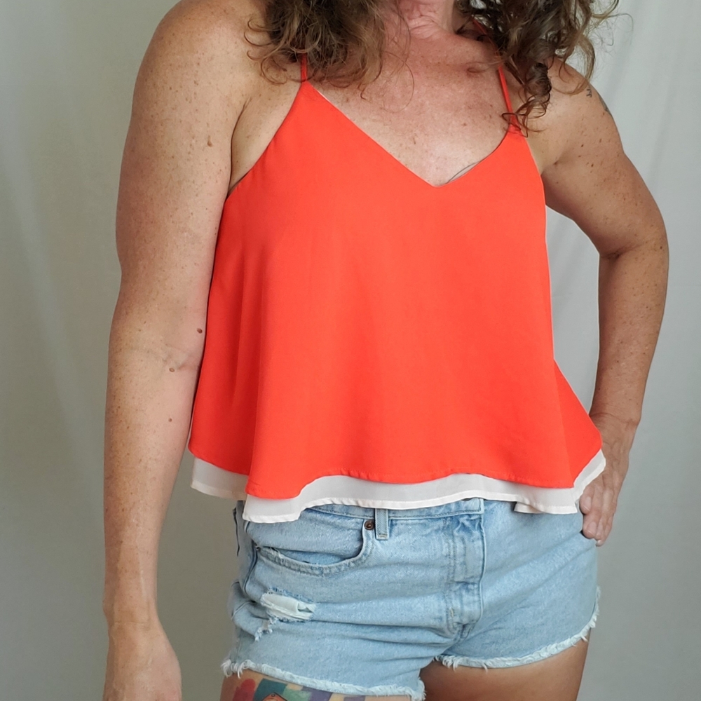 Lush women's orange flowy 2000s style crop top